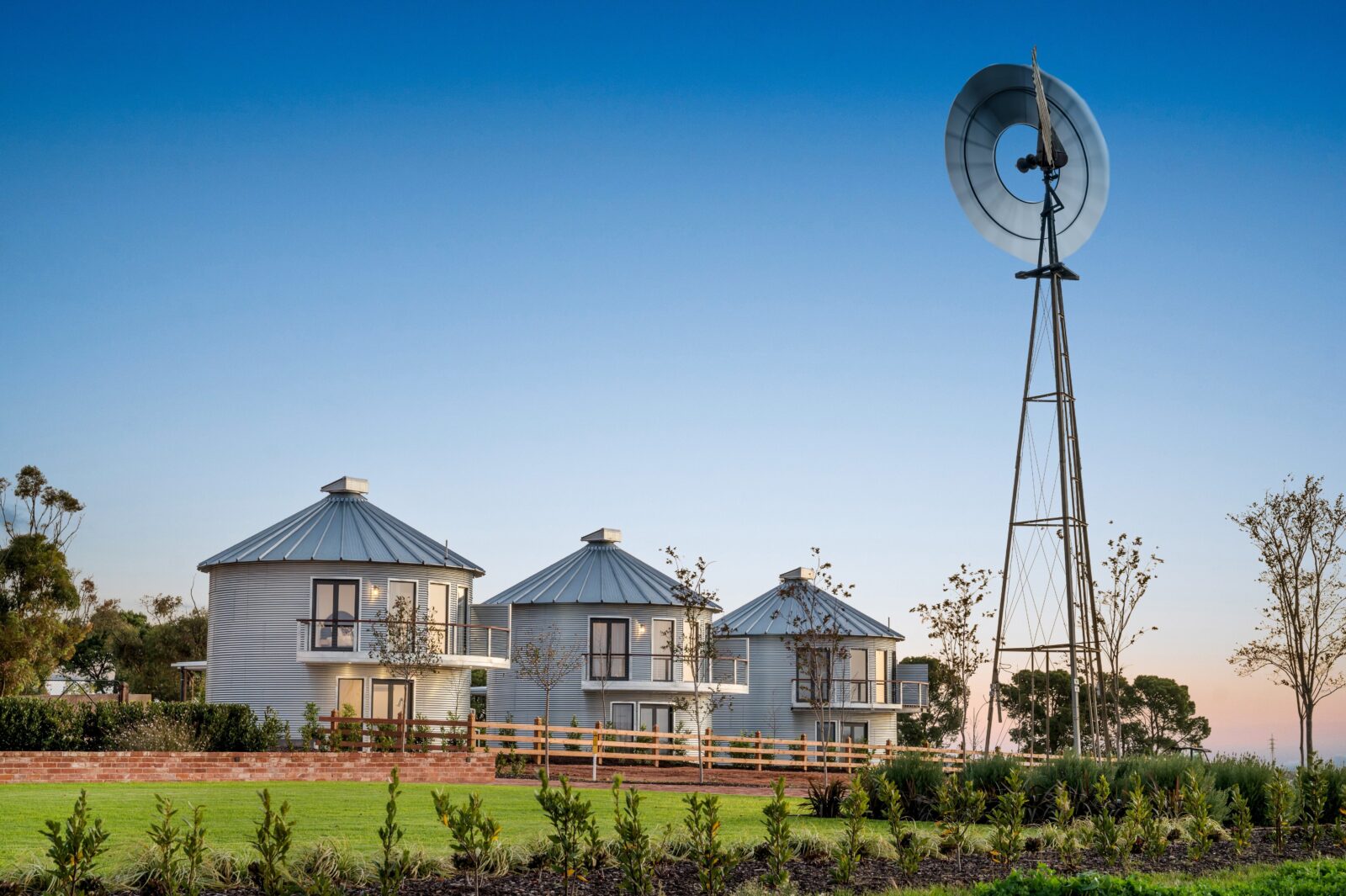 Three Silos, each of which is a boutique apartment. Balconies overlooking fields and windmill.