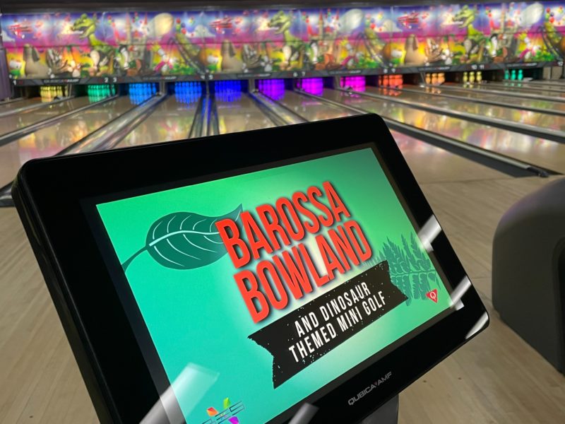 touch screen, Bowland logo and bowling pins in background