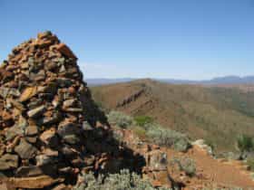 View of the historic rock cairn at the summit with breathtaking 360 degree views