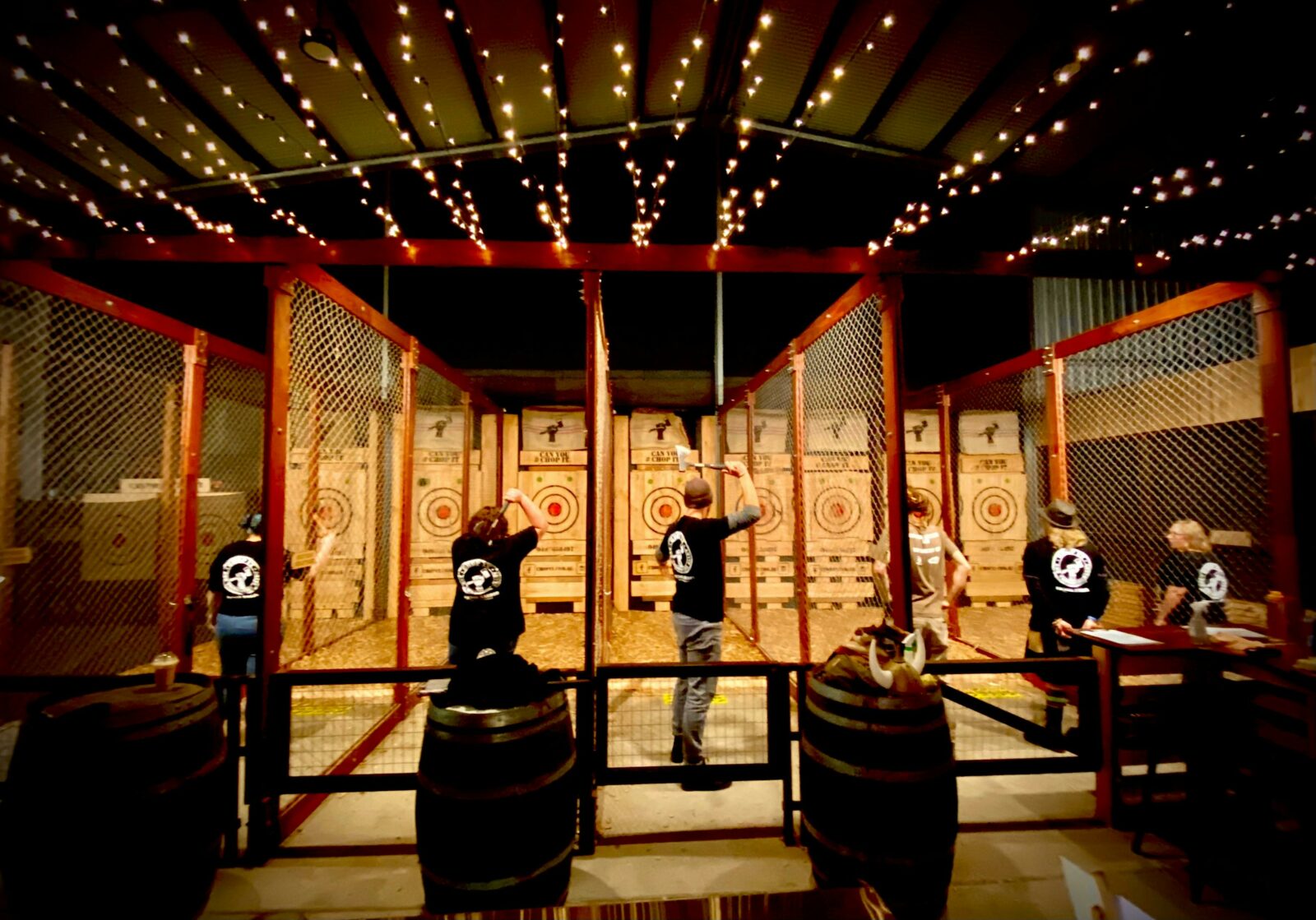 You of our eight axe throwing lanes with people throwing axes