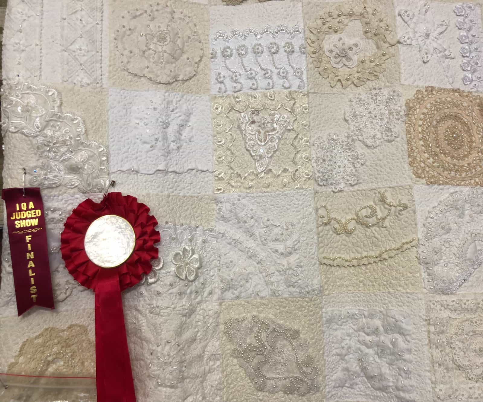 Heirloom Quilt - a queen size quilt constructed using vintage laces and doilies.