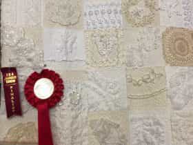 Heirloom Quilt - a queen size quilt constructed using vintage laces and doilies.