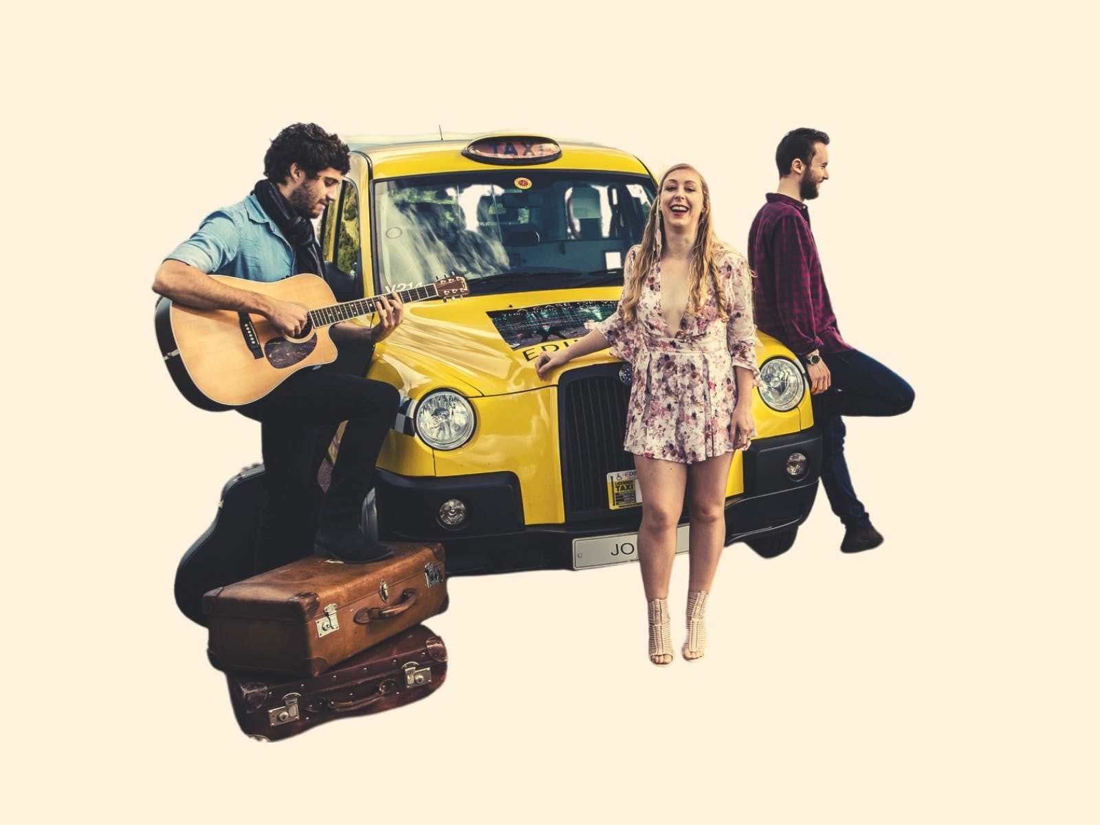 Three musicians are standing around a yellow taxi, laughing and playing the guitar