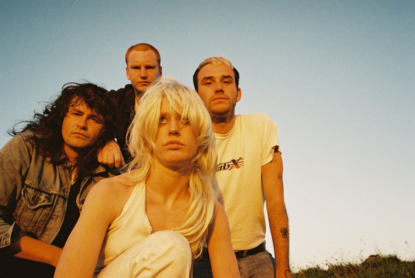 Group photo of Amyl and The Sniffers outside