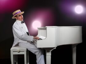 Brenton Edgecombe as Elton John