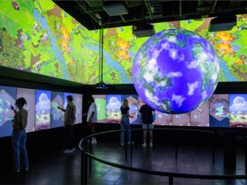 a large sphere with touch screens surrounding