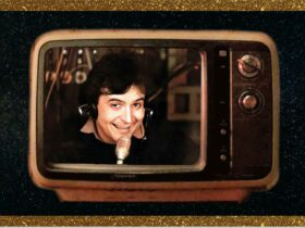 Gavin Wood with headphones and a microphone pictured on a vintage television screeb