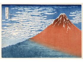 A landscape woodblock print of a japanese mountain with clouds surrounding