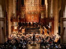 An orchestra plays in a church