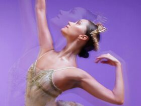 ballarina infront of purple background