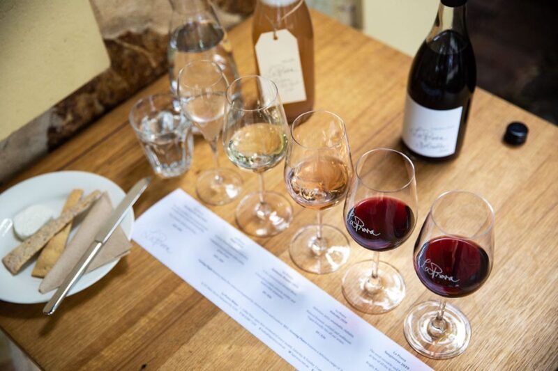 La Prova wine flight consists of 5 wines, Udder Delights Chevre cheese and crackers