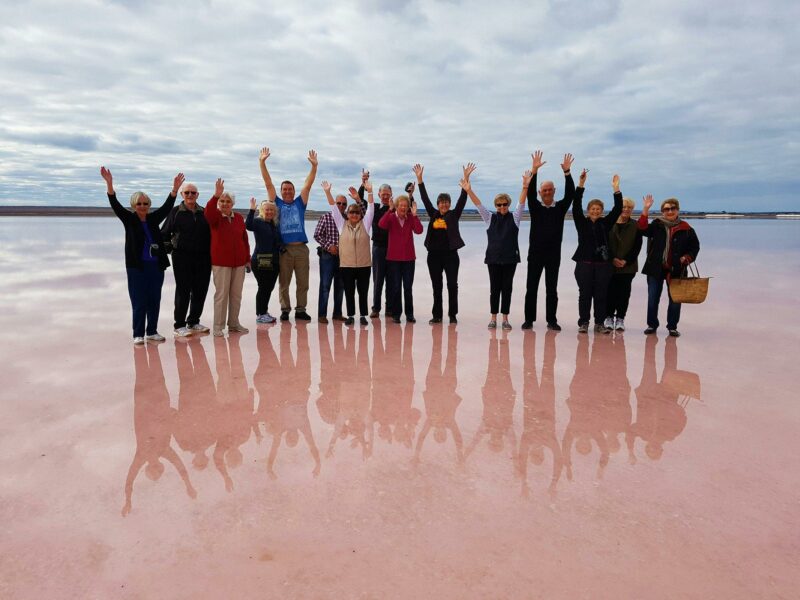Walk on the pink salt lake at Lochiel as part of the Lake Eyre Tours.