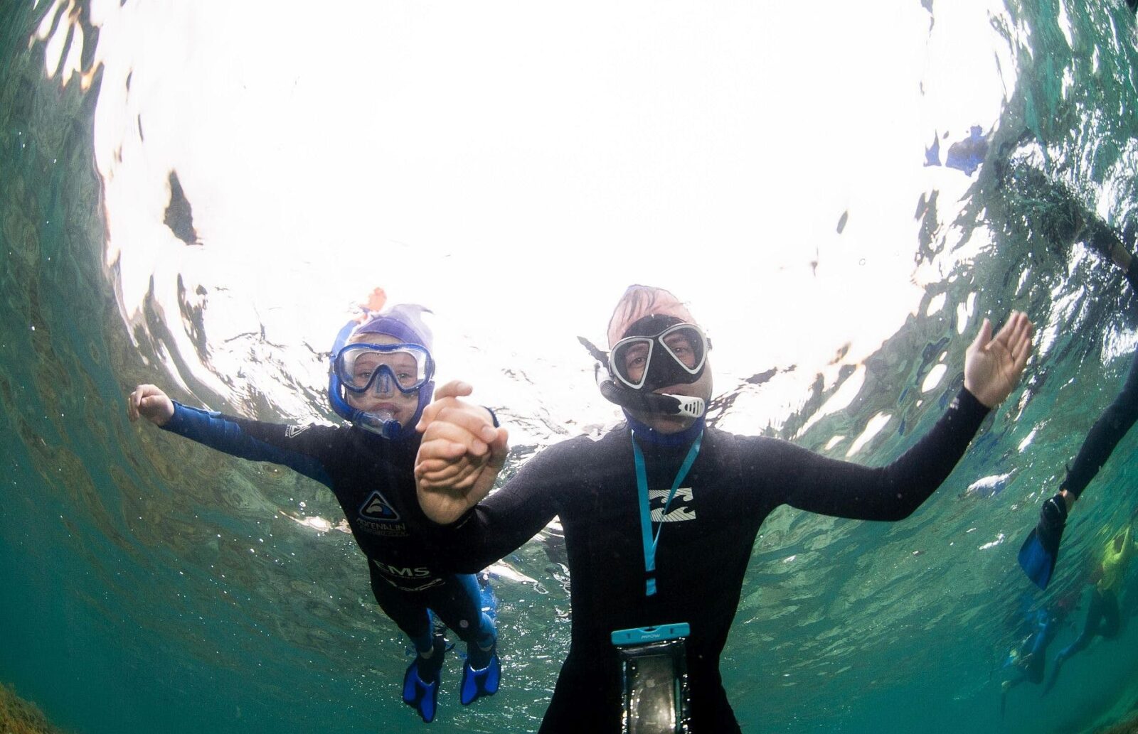 two people in the water snorkelling