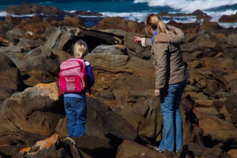Woman and Child exploring D' Estrees Bay Kangaroo Island in winter