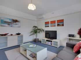 Air conditioned lounge room with LCD TV