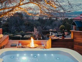 Outdoor Spa in rock garden with fire pit, views of Tamar Valley and River with moutain s & garden