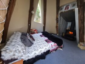Cosy tipees are a unique experiece, with wood fires, queen bed, shared bathroom and kitchen