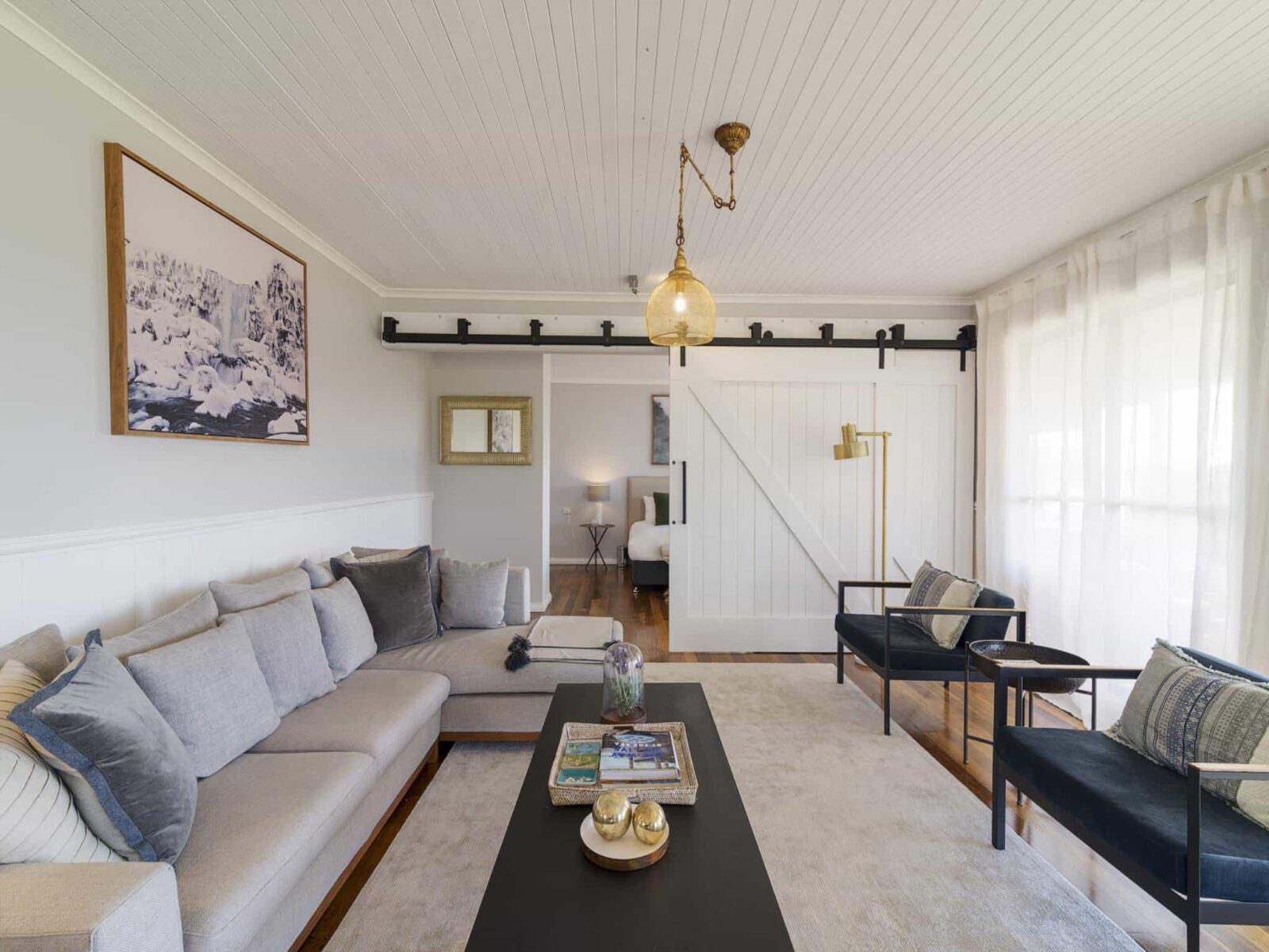 Living room with beautiful designer barn doors