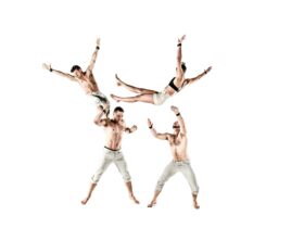 Four performers are captured in a moment of flux. Two are being thrown in the air by the other two.