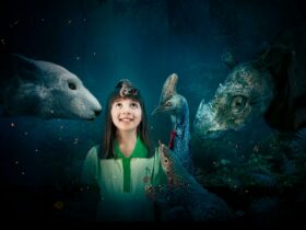 A child stands in a dreamy worls surrounded by animals