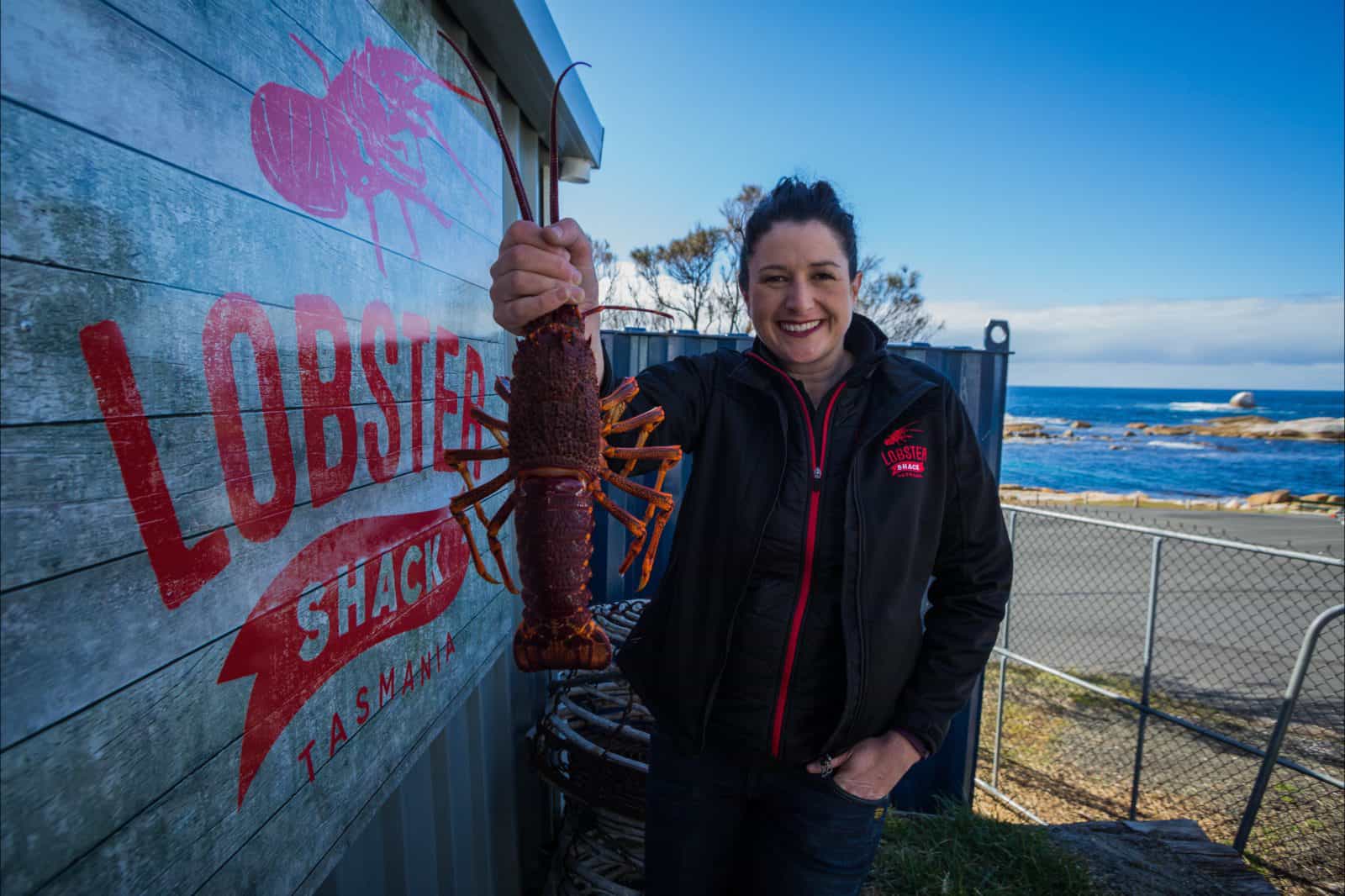 Sara holding one of our Famous Southern Rock Lobsters