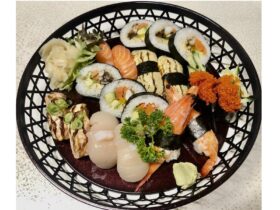a basket of sushi rolls