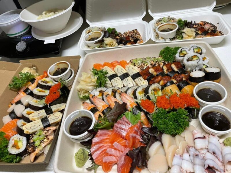 assorted of sushi and sashimi on the tray