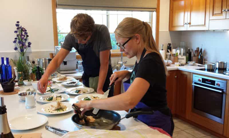 Students preparing seafood dishes in Sylvia's Kitchen Tasmanian Fabulous Fish Class