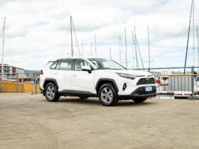 A white Toyota SUV car parked at Hobart's docks