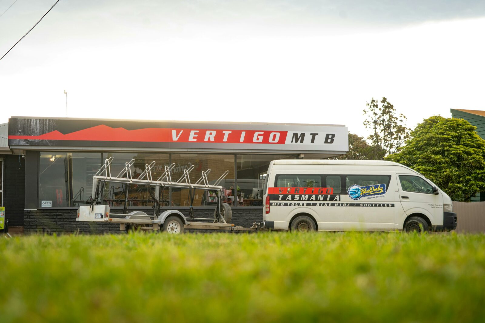 Vertigo Shuttle bus in front of Vertigo St Helens store
