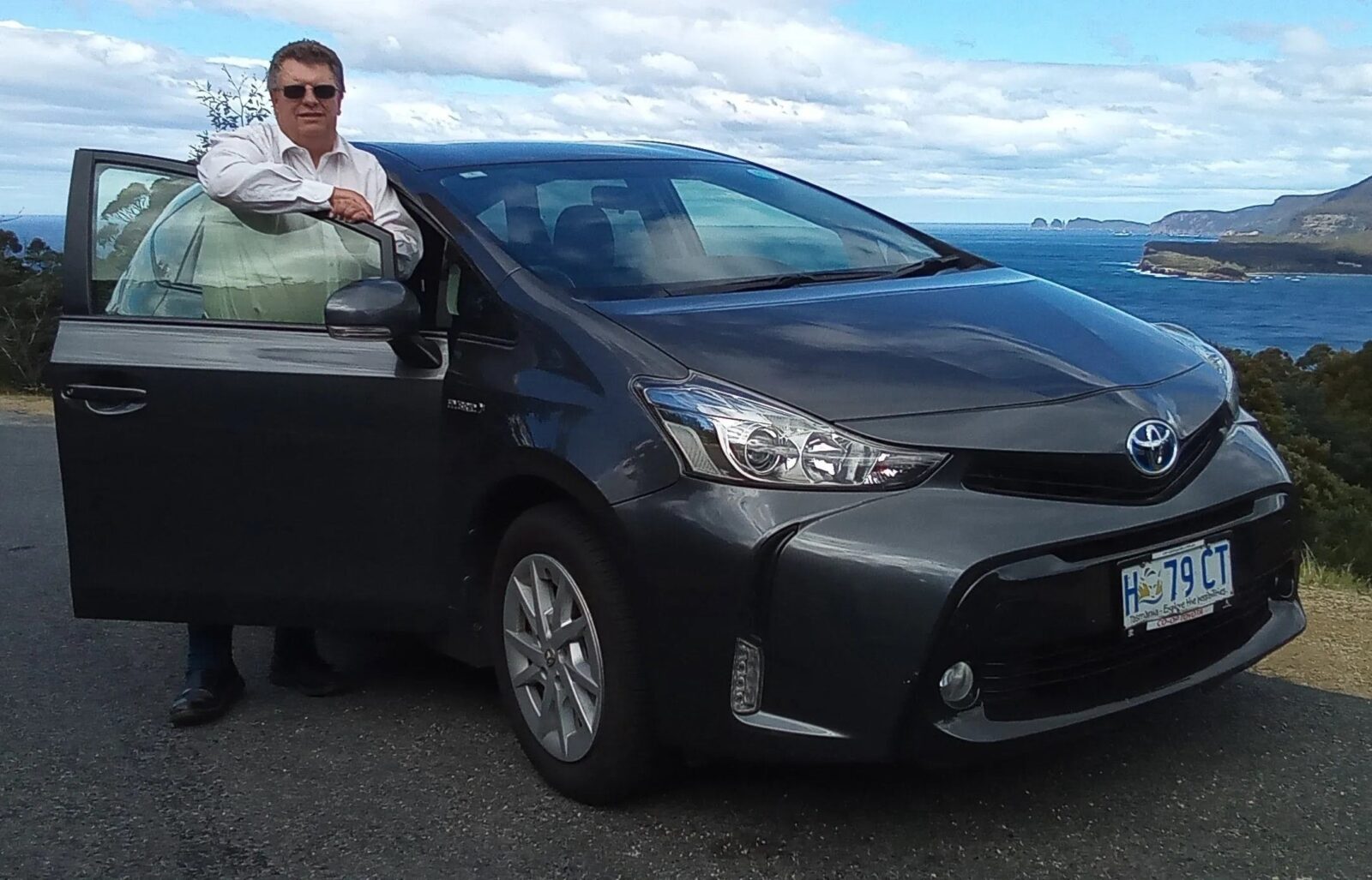 Philip with the car at a lookout on the Tasman Peninsula