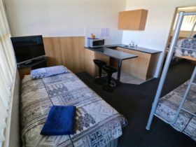 Comfortable compact family accommodation from $155. Free Wi-Fi access Two rooms Front Room –Kitchene