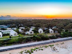 Sunset over our waterfront beach houses at the Barwon Heads Caravan Park