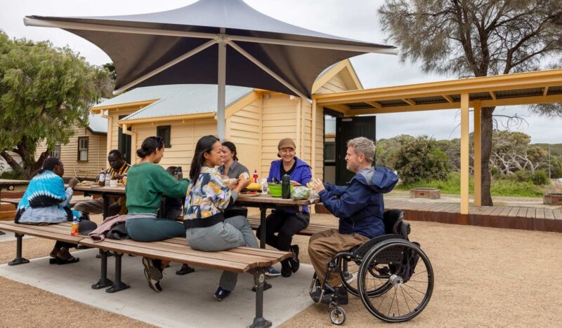 group enjoy picnic table facilities and wheelchair access