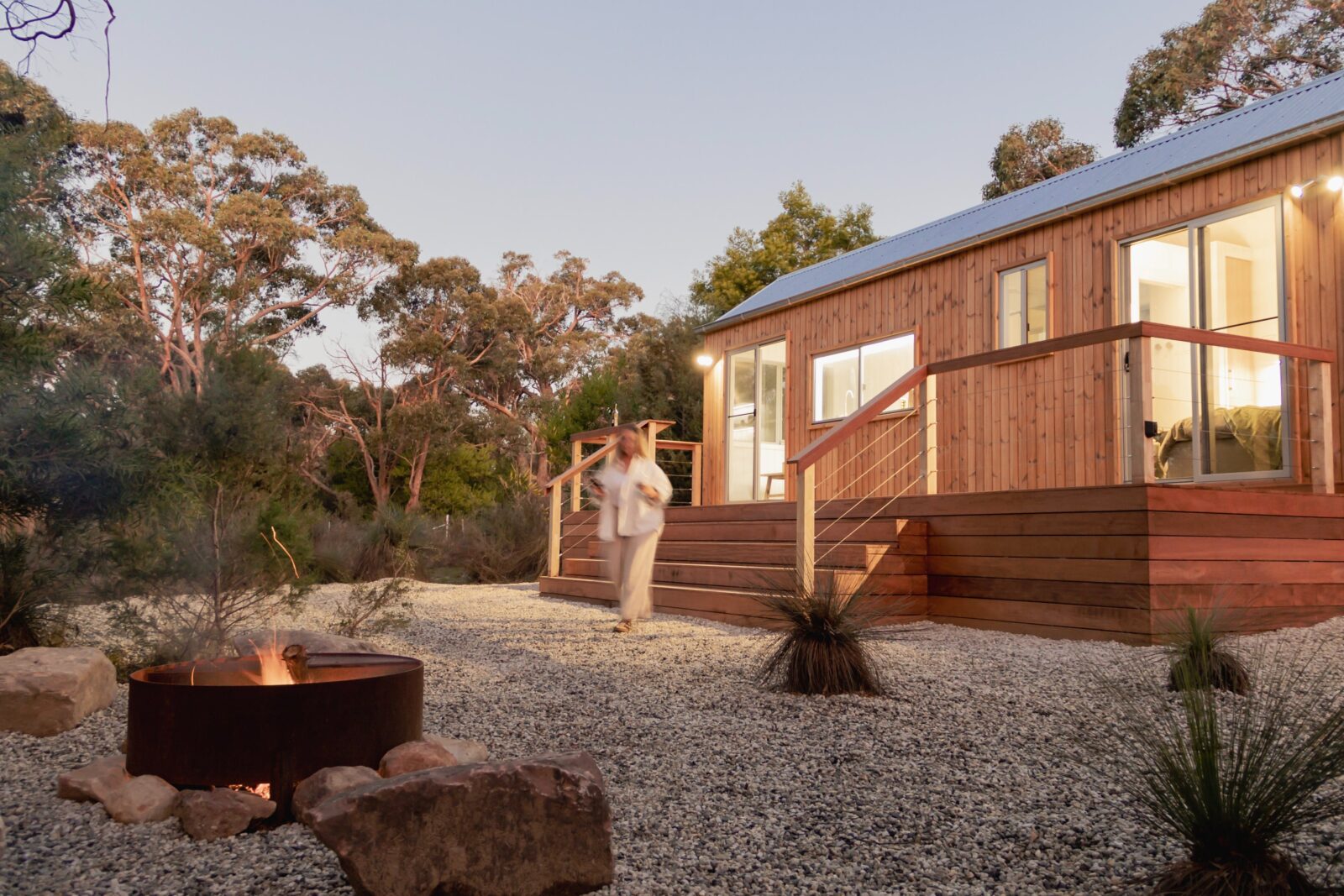 Exterior of Grass Tree Tiny Home and fire pit