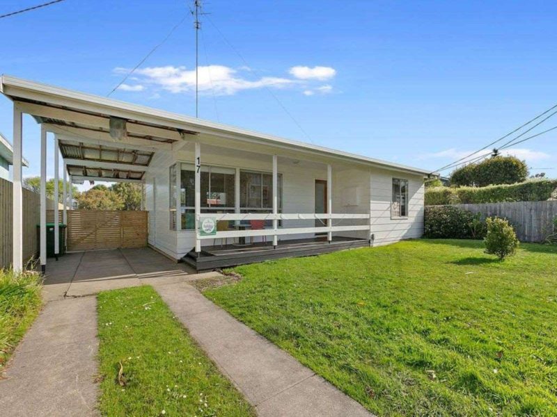 1970s weatherboard home with free parking on site.