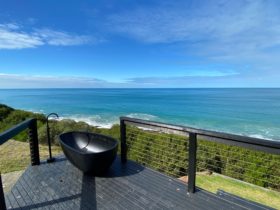 Outdoor bath with a view of the ocean