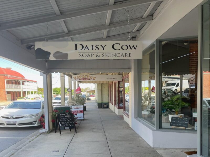Street view of Daisy Cow Soap & Skincare signage