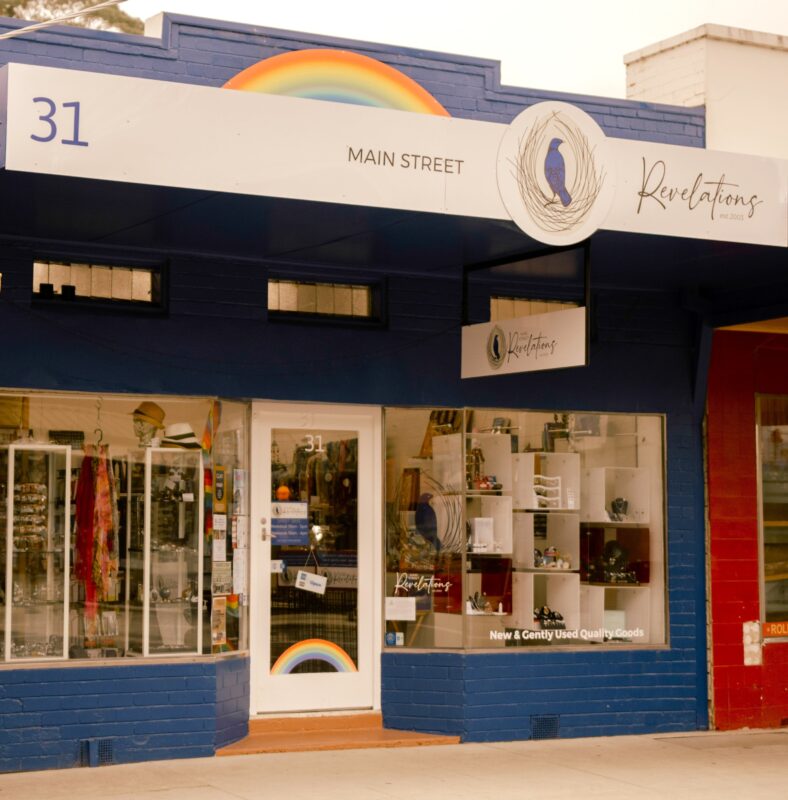This photo shows the shopfront with fresh blue paint and white trim to match the new bower bird logo