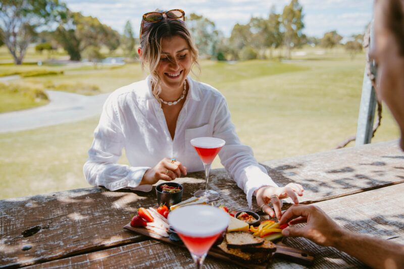 Woman enjoying cocktails