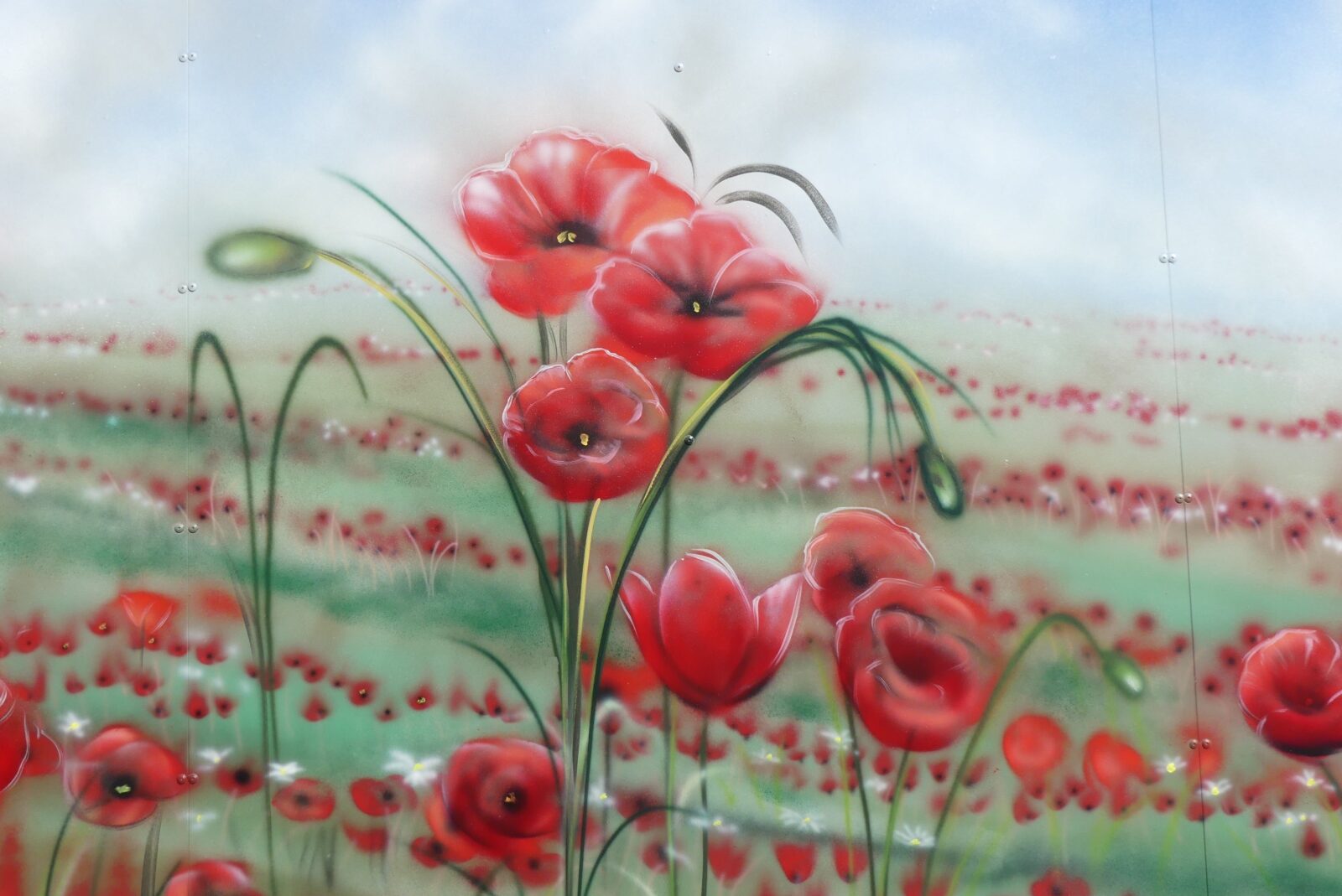 Close up of painted poppies in the mural for Anzac and Everyone