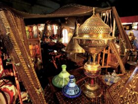 Various traditional trinkets and artistic pieces in a room with a bazaar-style appearance