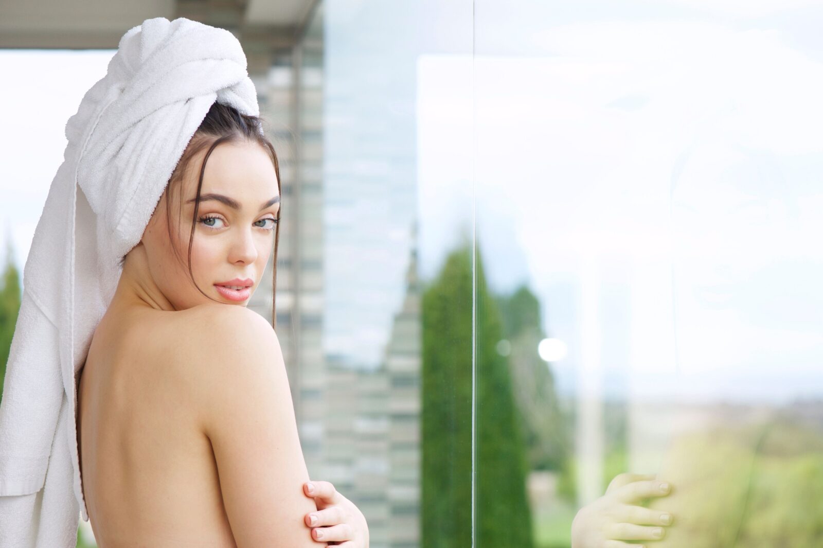 Woman wearing hair wrapped in a towel