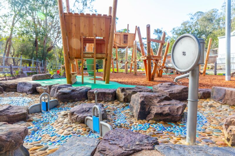 Playspace dry river bed with water pump