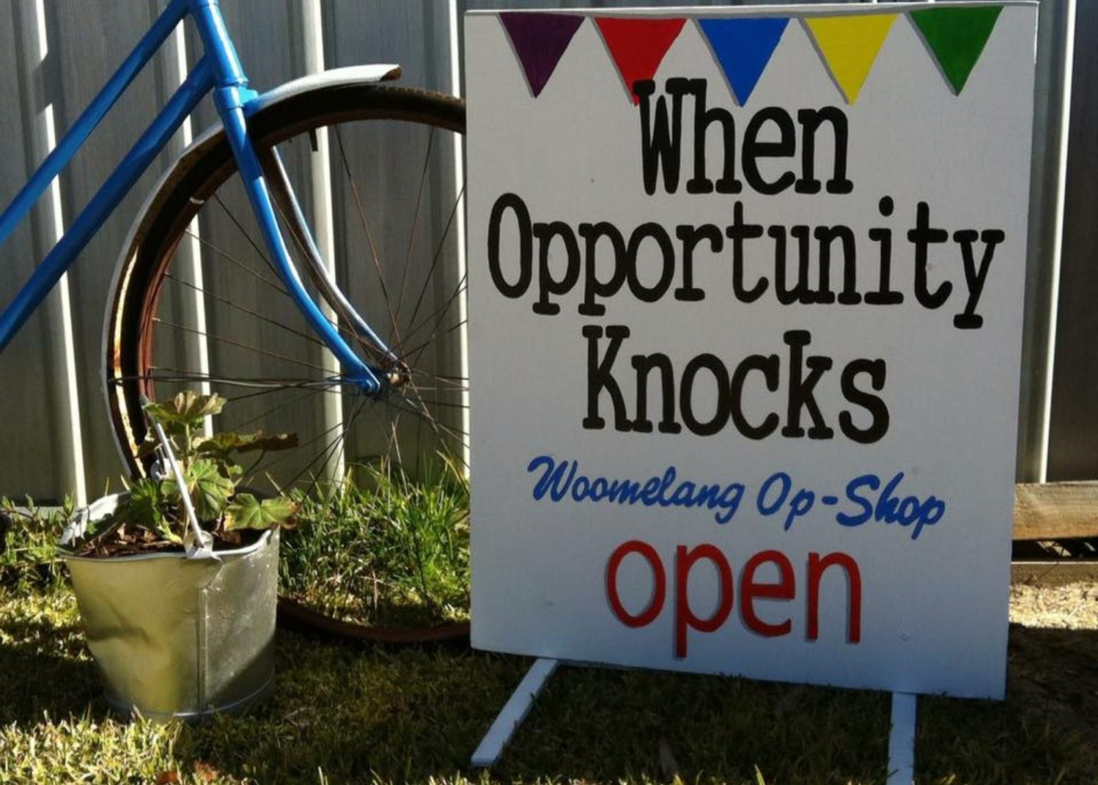 Sign out front of 'open' Woomelang Op Shop