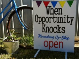 Sign out front of 'open' Woomelang Op Shop