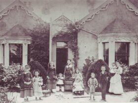 ‘Augusta Levinson and nine children (with a maid) outside their house in Ballarat’, c 1875-1876