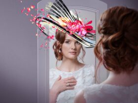 A photo of Anna O'Byrne looking in a mirror with an extravagant hat drawn on her head