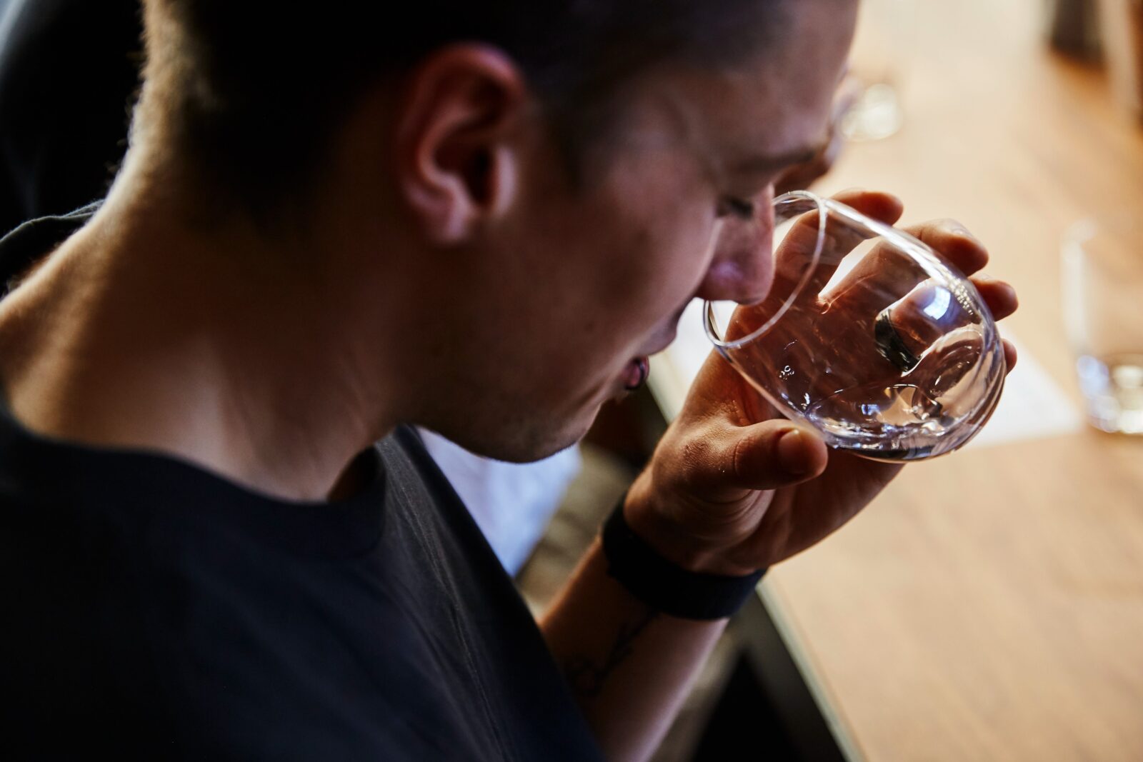 Guest smelling gin during tasting