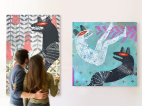 A couple look at two large paintings on a wall from Donina Asera's exhibition 'Arpais & Sebrack'